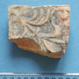 Połowa XII w. - fragment płytki posadzkowej tzw. typu wawelskiego